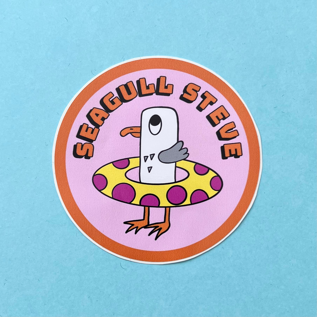 Seagull Steve vinyl water resistant sticker approximately 88cm in diameter. He is grey and white with an orange beak and feet with big eyes. He has a large rubber ring that is yellow with bright pink dots. He is on a pale pink background with orange lettering that says Seagull Steve with a black drop shadow. 