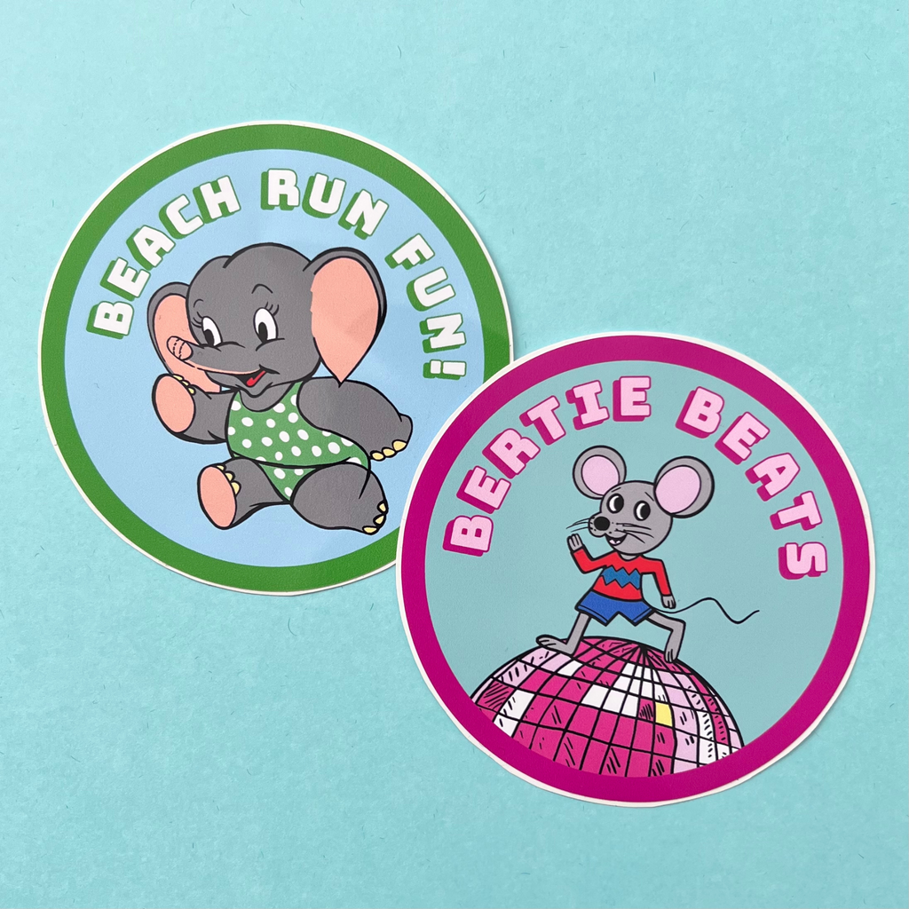 Grey elephant in a green polka dot bikini running along a beach having fun. Pale blue sky background. Words on it say beach fun run. Cute elephant has a little smile. A round sticker with white text and a bright green drop shadow and a thick bright green line around the edge of the circle. Water resistant, glossy sticker approximately 88mm in diameter. In this picture Bertie Beats is seen next to Beach Run Fun sticker. Bertie Beats is running on top of his disco ball.