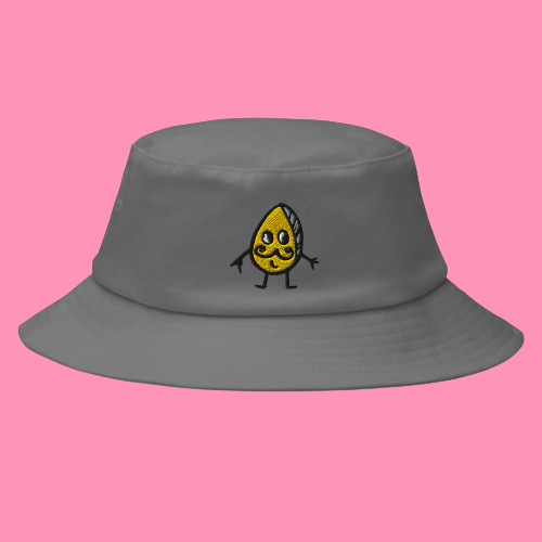 Mr Pistachio a cute character embroidered on this bucket hat. He is embroidered in yellow, white, black and grey on this mid grey bucket hat.