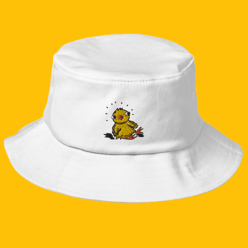 White cotton bucket hat with embroidered chick on the front. The chick is bright yellow and cute. The hat is shown on a yellow background.