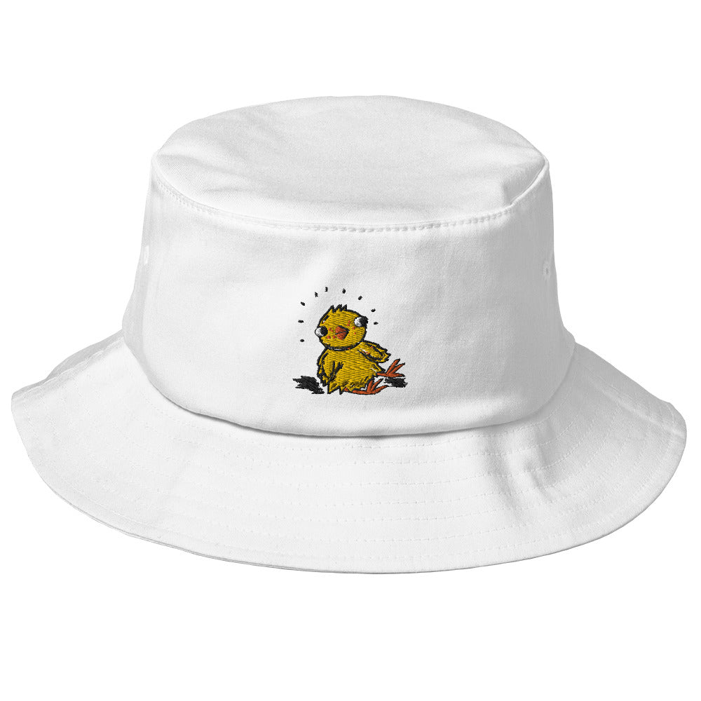 White cotton bucket hat with embroidered chick on the front. The chick is bright yellow and cute. Hat is shown on a white background.